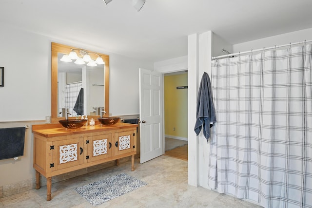 bathroom with vanity and a shower with curtain
