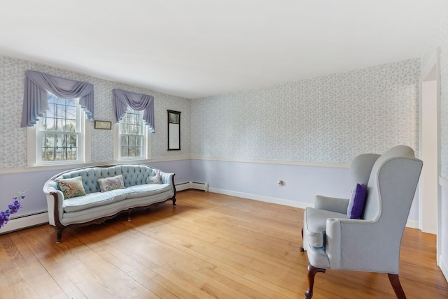 117 Youngs Ridge Rd, Acton, ME 04001 - living area featuring wallpapered walls, wood finished floors, and baseboard heating
