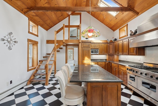 117 Youngs Ridge Rd, Acton, ME 04001 - kitchen with high vaulted ceiling, tile patterned floors, dark countertops, stainless steel appliances, and wooden ceiling