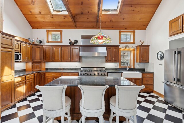 117 Youngs Ridge Rd, Acton, ME 04001 - kitchen featuring wooden ceiling, a sink, wall chimney range hood, stainless steel appliances, and dark floors