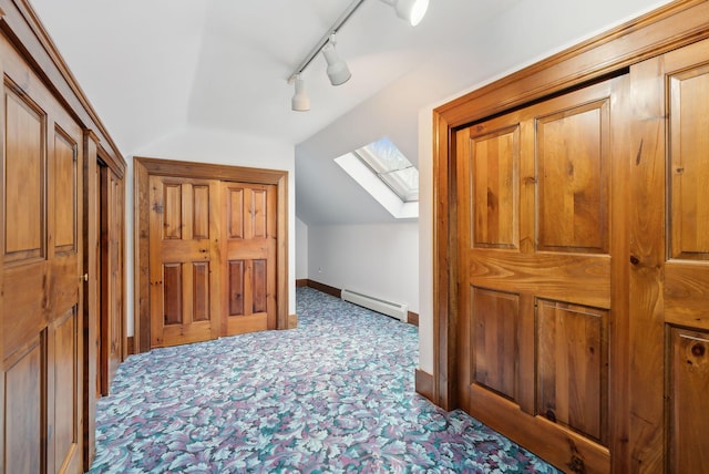 117 Youngs Ridge Rd, Acton, ME 04001 - additional living space with carpet floors, a baseboard heating unit, baseboards, and lofted ceiling with skylight