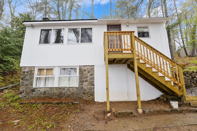 738 13th St, Acton, ME 04001 - rear view of house featuring stairway