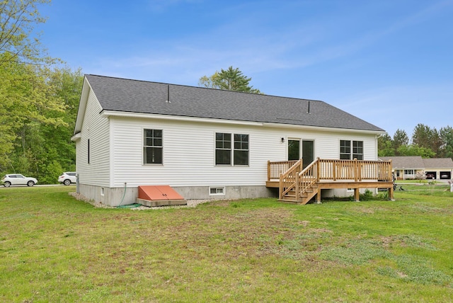 79 Colins Meadow Ln, Alfred, ME 04002 - back of property with a deck, a lawn, and roof with shingles