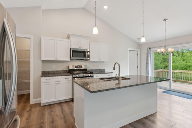 79 Colins Meadow Ln, Alfred, ME 04002 - kitchen with appliances with stainless steel finishes, a sink, white cabinets, dark wood-style flooring, and high vaulted ceiling