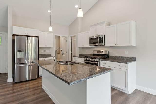 79 Colins Meadow Ln, Alfred, ME 04002 - kitchen featuring stainless steel appliances, a sink, high vaulted ceiling, a kitchen island with sink, and white cabinets