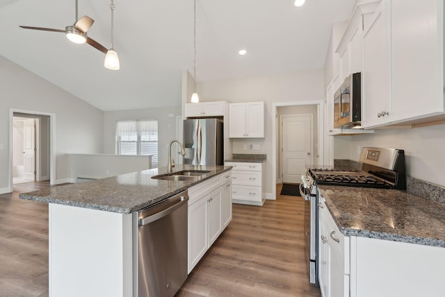 79 Colins Meadow Ln, Alfred, ME 04002 - kitchen with appliances with stainless steel finishes, a sink, light wood finished floors, white cabinets, and lofted ceiling
