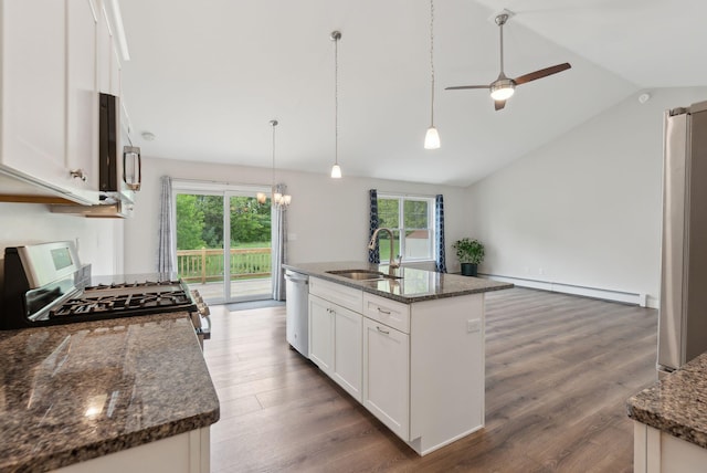 79 Colins Meadow Ln, Alfred, ME 04002 - kitchen with a sink, baseboard heating, plenty of natural light, appliances with stainless steel finishes, and vaulted ceiling