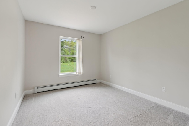 79 Colins Meadow Ln, Alfred, ME 04002 - carpeted spare room with a baseboard heating unit and baseboards