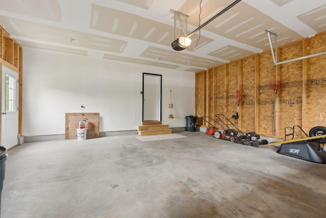 79 Colins Meadow Ln, Alfred, ME 04002 - garage featuring a garage door opener