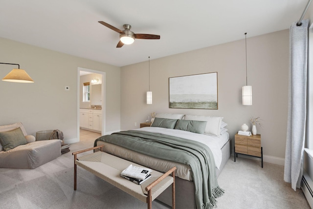 79 Colins Meadow Ln, Alfred, ME 04002 - bedroom with light carpet, baseboards, ensuite bathroom, and ceiling fan