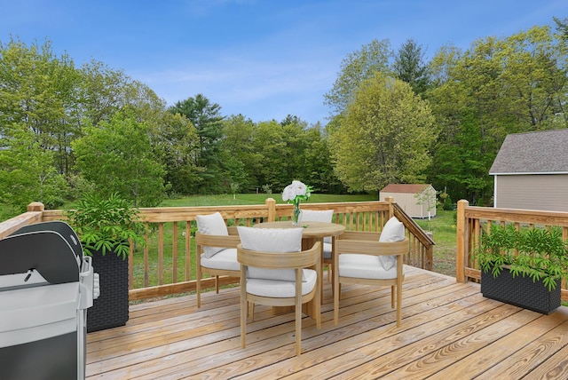 79 Colins Meadow Ln, Alfred, ME 04002 - deck featuring area for grilling, outdoor dining area, and a lawn