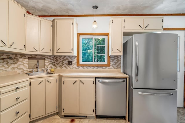 8 Sylvan Rd, Orono, ME 04473 - kitchen featuring stainless steel appliances, decorative backsplash, light countertops, and decorative light fixtures