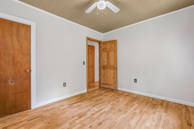 8 Sylvan Rd, Orono, ME 04473 - empty room with ornamental molding, light wood finished floors, and a ceiling fan