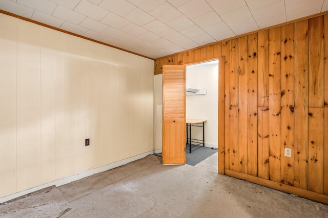 8 Sylvan Rd, Orono, ME 04473 - spare room with wooden walls and ornamental molding