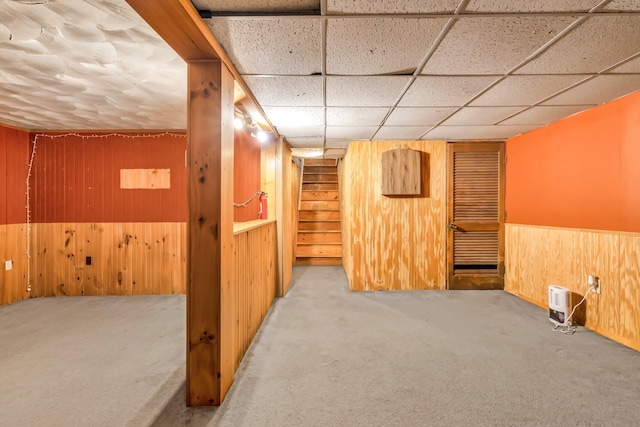 8 Sylvan Rd, Orono, ME 04473 - finished below grade area featuring wood walls, carpet flooring, stairs, and a wainscoted wall