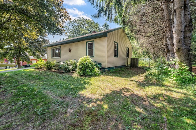 8 Sylvan Rd, Orono, ME 04473 - view of home's exterior with a yard