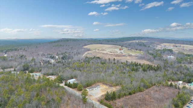 bird's eye view featuring a forest view