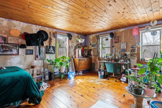 bedroom featuring wood ceiling and hardwood / wood-style flooring
