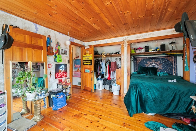 bedroom featuring wooden ceiling and hardwood / wood-style floors