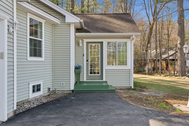 34 Jordan Shore Dr, Poland, ME 04274 - view of exterior entry featuring roof with shingles