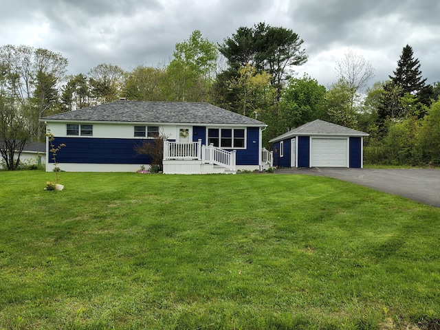 90 Whig St, Winterport, ME 04496 - ranch-style house with an outbuilding, a detached garage, asphalt driveway, and a front yard