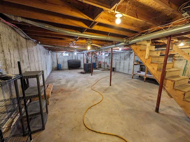 unfinished below grade area with stairway and heating fuel