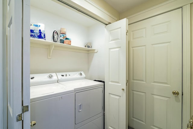 laundry room featuring washer and dryer and laundry area