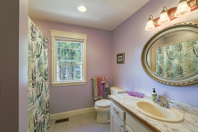 full bathroom with tile patterned floors, vanity, baseboards, toilet, and visible vents