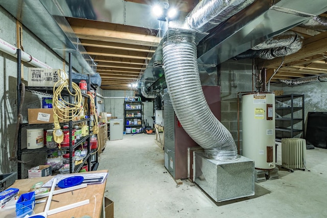 unfinished below grade area featuring water heater
