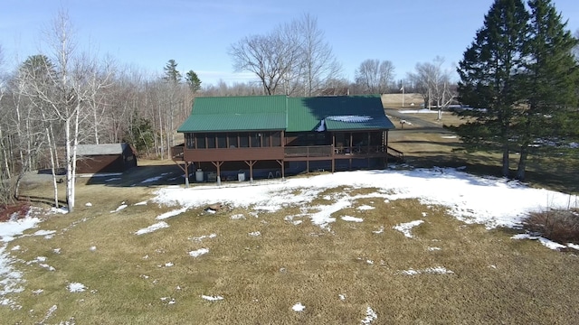 1083 N Rd, Ripley, ME 04930 - snow covered back of property with metal roof