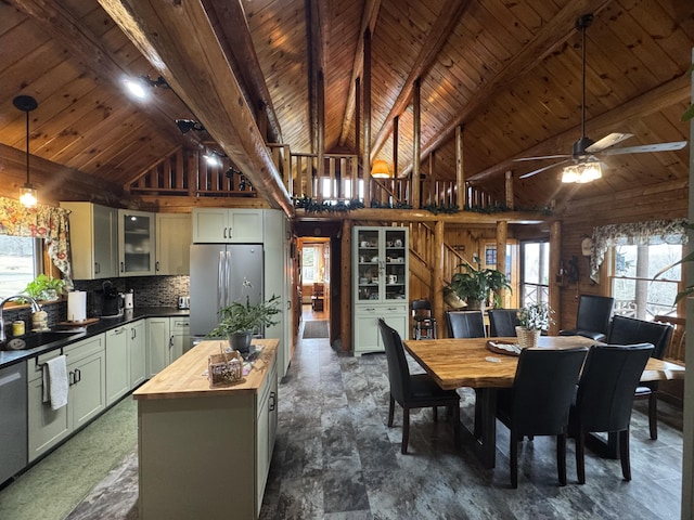 1083 N Rd, Ripley, ME 04930 - dining room featuring wood ceiling, beamed ceiling, and a wealth of natural light