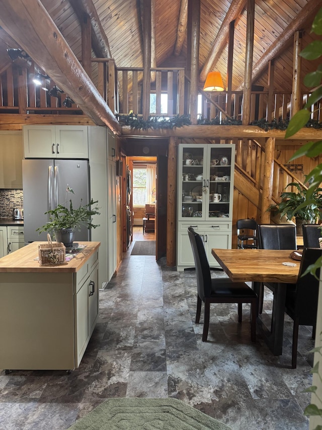 1083 N Rd, Ripley, ME 04930 - dining room featuring high vaulted ceiling, stone finish floor, wood ceiling, and beam ceiling