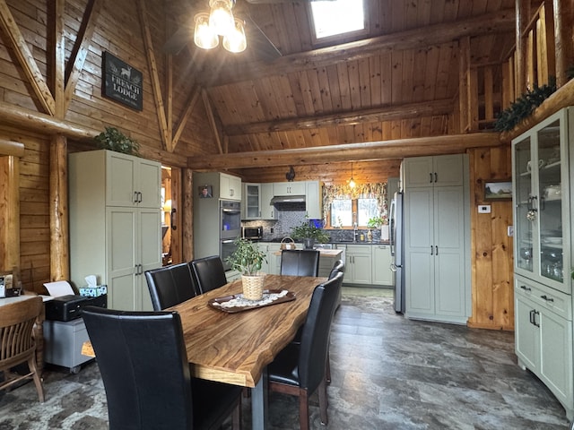 1083 N Rd, Ripley, ME 04930 - dining area featuring wood ceiling, high vaulted ceiling, and beam ceiling