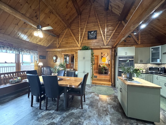 1083 N Rd, Ripley, ME 04930 - dining room featuring high vaulted ceiling, wood ceiling, beam ceiling, and ceiling fan