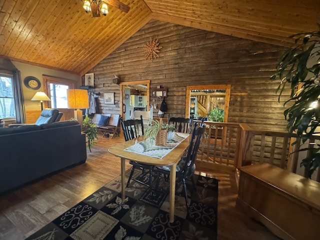 1083 N Rd, Ripley, ME 04930 - dining space with wooden ceiling, ceiling fan, rustic walls, wood finished floors, and high vaulted ceiling