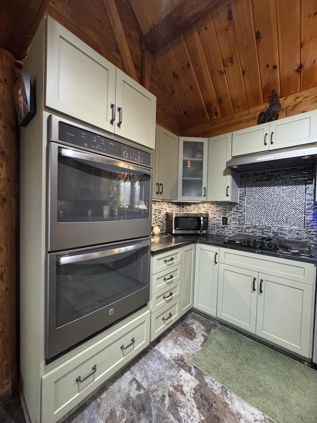 1083 N Rd, Ripley, ME 04930 - kitchen featuring tasteful backsplash, lofted ceiling with beams, dark countertops, wood ceiling, and stainless steel appliances