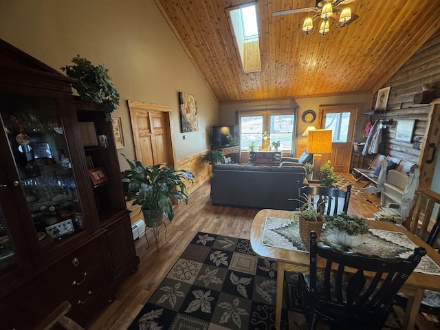 1083 N Rd, Ripley, ME 04930 - dining room with wooden ceiling, ceiling fan, wood finished floors, a skylight, and high vaulted ceiling