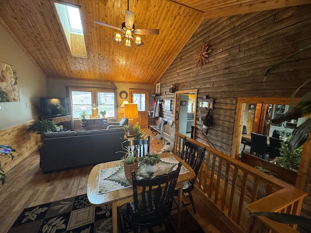 1083 N Rd, Ripley, ME 04930 - dining room featuring a ceiling fan, a skylight, high vaulted ceiling, wooden ceiling, and wood finished floors