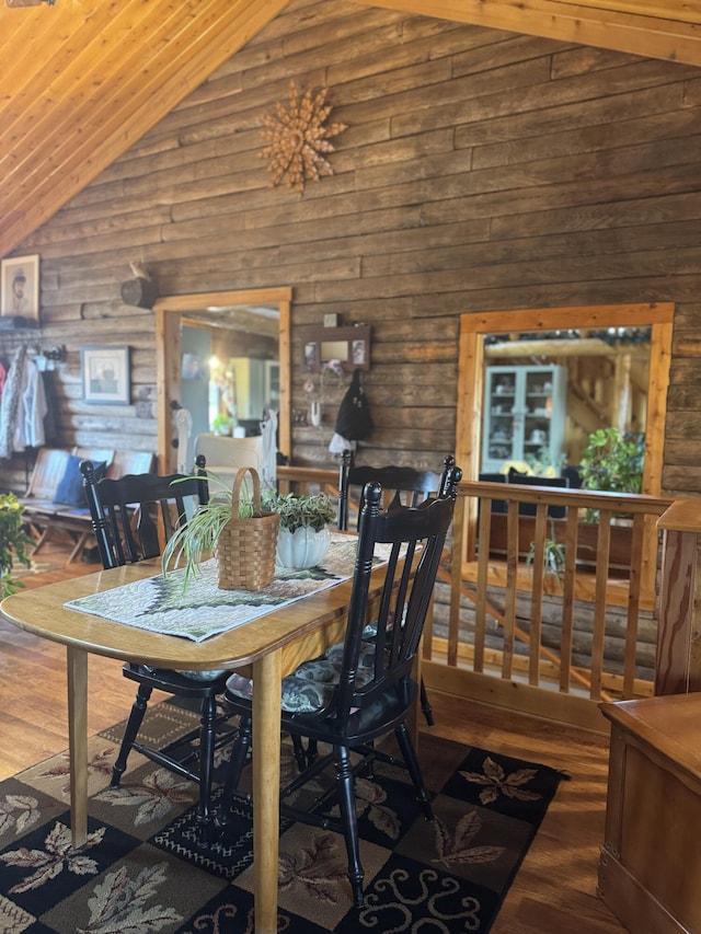 1083 N Rd, Ripley, ME 04930 - dining space featuring wood ceiling, wood finished floors, log walls, and lofted ceiling