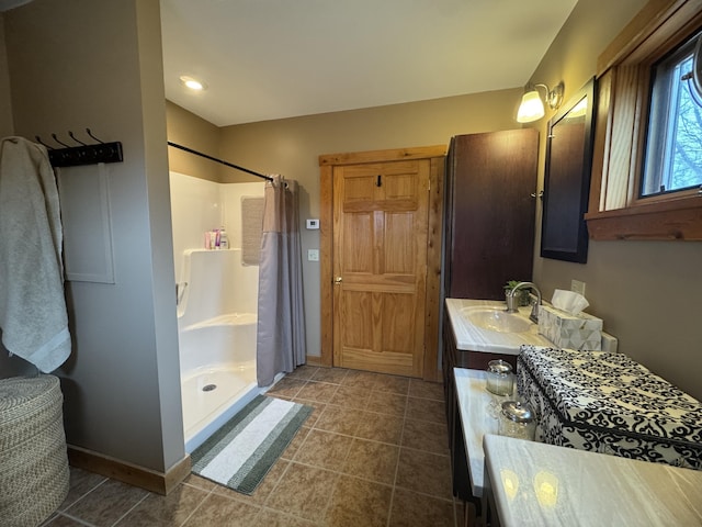 1083 N Rd, Ripley, ME 04930 - bathroom with tile patterned flooring, baseboards, a stall shower, and vanity