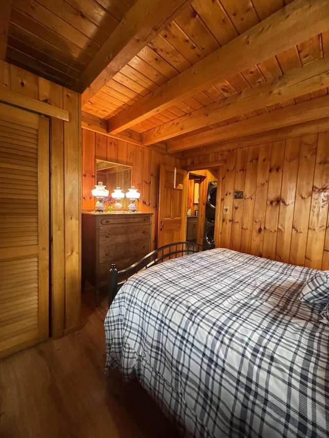 1083 N Rd, Ripley, ME 04930 - bedroom featuring wooden walls, beam ceiling, wood finished floors, and wood ceiling