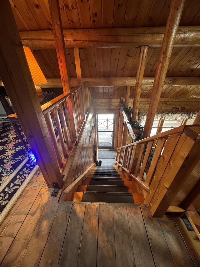 1083 N Rd, Ripley, ME 04930 - stairway featuring wood-type flooring, wooden ceiling, and beam ceiling
