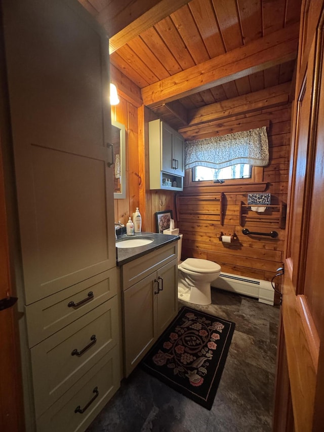 1083 N Rd, Ripley, ME 04930 - bathroom featuring vanity, toilet, wooden ceiling, wood walls, and a baseboard radiator