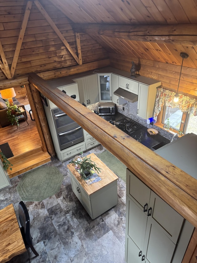 1083 N Rd, Ripley, ME 04930 - living area featuring wood walls, wood ceiling, and vaulted ceiling with beams