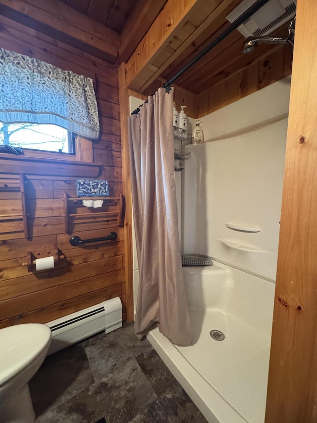1083 N Rd, Ripley, ME 04930 - bathroom featuring baseboard heating, a stall shower, wooden walls, and toilet