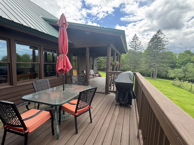 1083 N Rd, Ripley, ME 04930 - wooden terrace with outdoor dining space, a lawn, and grilling area
