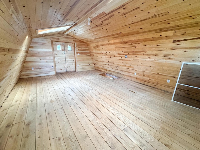 108/9 113 Sandy Beach Rd, Glenburn, ME 04401 - additional living space featuring lofted ceiling, wooden walls, hardwood / wood-style flooring, and wood ceiling