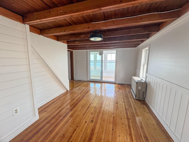 108/9 113 Sandy Beach Rd, Glenburn, ME 04401 - interior space featuring wooden walls, hardwood / wood-style floors, wooden ceiling, and beam ceiling