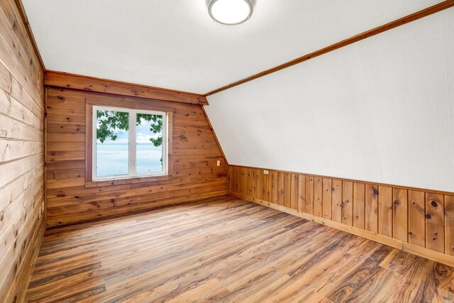 108/9 113 Sandy Beach Rd, Glenburn, ME 04401 - spare room featuring wooden walls and wood finished floors