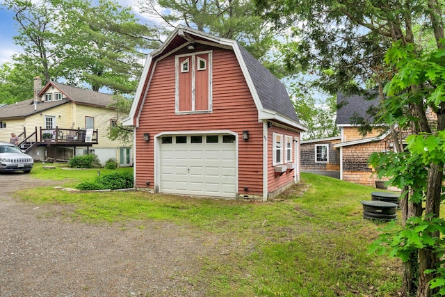 108/9 113 Sandy Beach Rd, Glenburn, ME 04401 - view of side of home with a detached garage, an outdoor structure, a barn, a shingled roof, and a gambrel roof